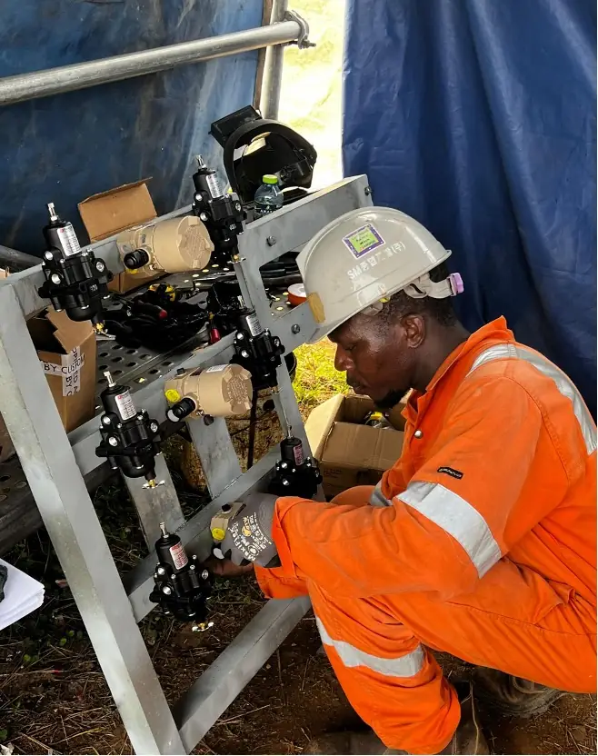 ICSIGH engineer installing instrumentation on a gas skid